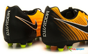 Pomarańczowo-czarne buty piłkarskie Nike Magistax Ola FG 844420-801