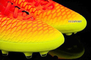 Czerwono-żółte buty piłkarskie Nike Magista Orden FG 651329-807